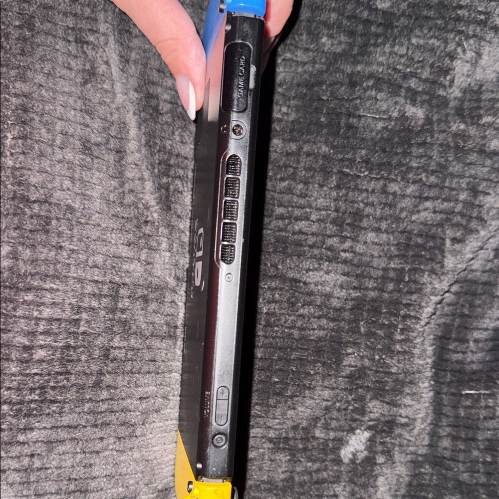 Yellow and Blue Gaming Console - Picture 4 of 13